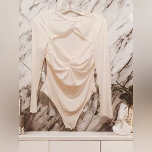 NWOT Women’s Long Sleeve Bodysuit White Size L